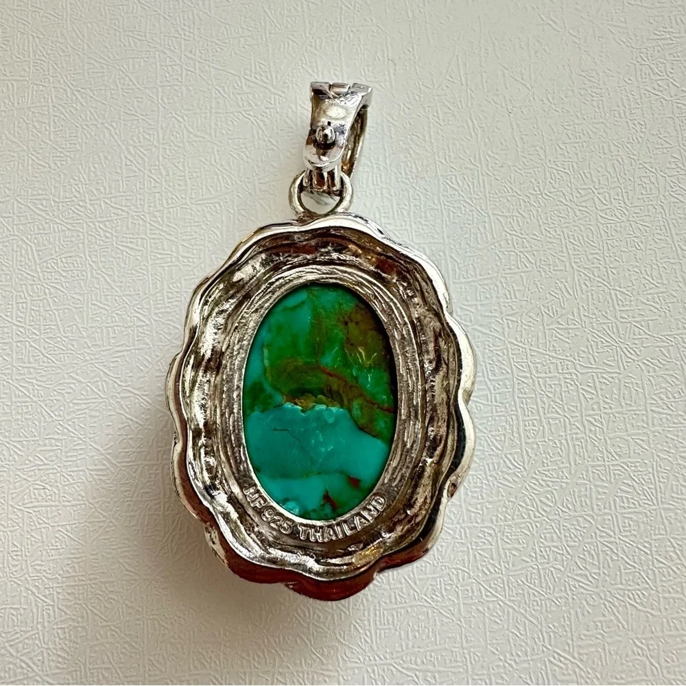 Silver and Turquoise Western Style Pendant